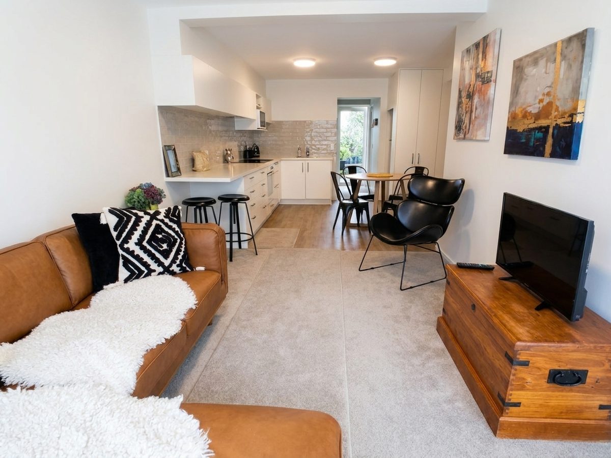 Kitchen and living area after: a level, well-composed wide shot